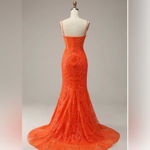 Orange prom dress. Great quality. Never worn.